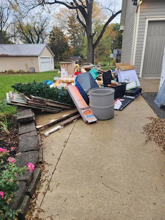 Dumpster being loaded with debris for Demolition Dumpster Rental in Palo Cedro